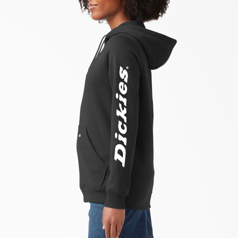 Load image into Gallery viewer, Person wearing a black hoodie with 'Dickies' logo on a white background
