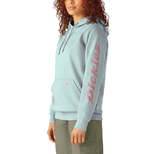 Person wearing a light blue hoodie with 'Dickies' logo on a white background