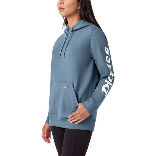 Blue hoodie with 'Dickies' branding on sleeve, worn by a person on a white background