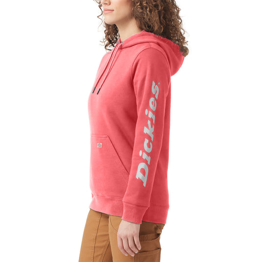 Person wearing a pink hoodie with 'Dickies' branding on a white background