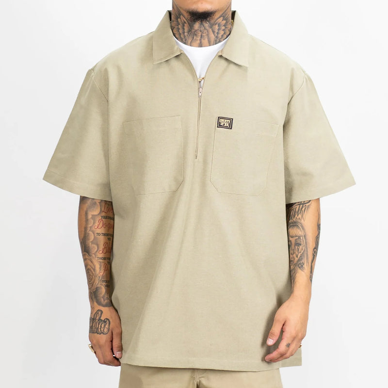 Load image into Gallery viewer, FB County short sleeve half zip shirt in solid khaki color.
