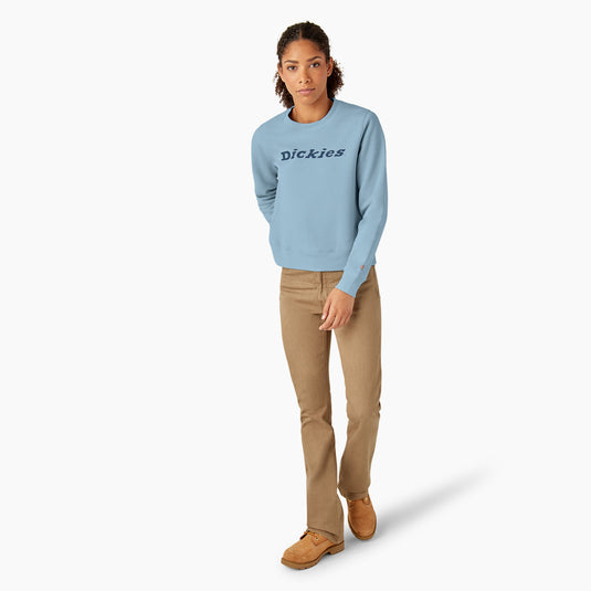 This light blue heavyweight fleece crewneck sweatshirt features a relaxed fit, shorter length that falls just below the waist, and the "Dickies" logo on the front center chest.