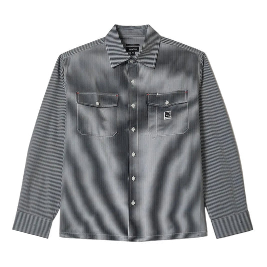 Striped shirt with two front button-down flap pockets and a Brixton woven label on the left chest.