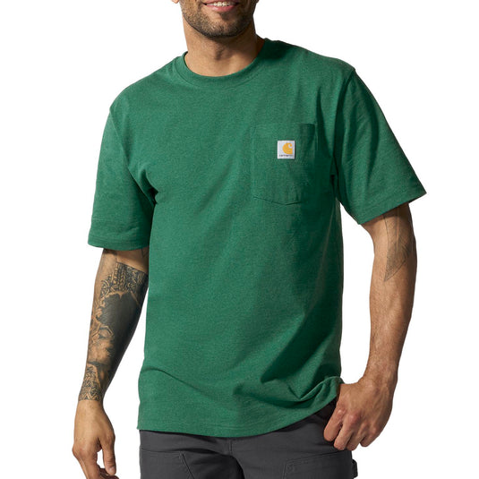 Man wearing a green t-shirt with a visible Carhartt brand logo on left chest pocket.