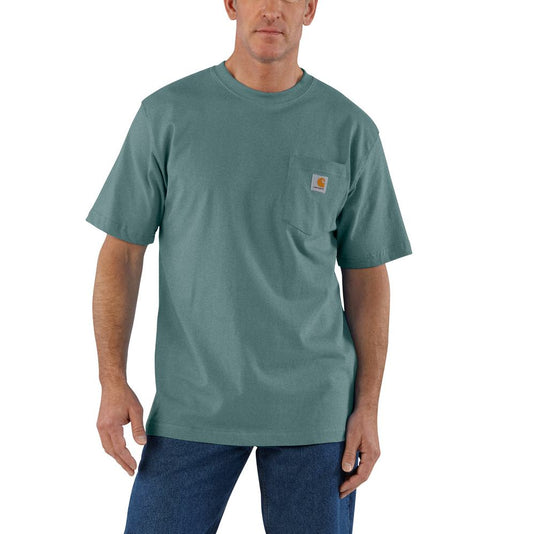 Man wearing a teal pine green t-shirt with a Carhartt logo on the left chest pocket 