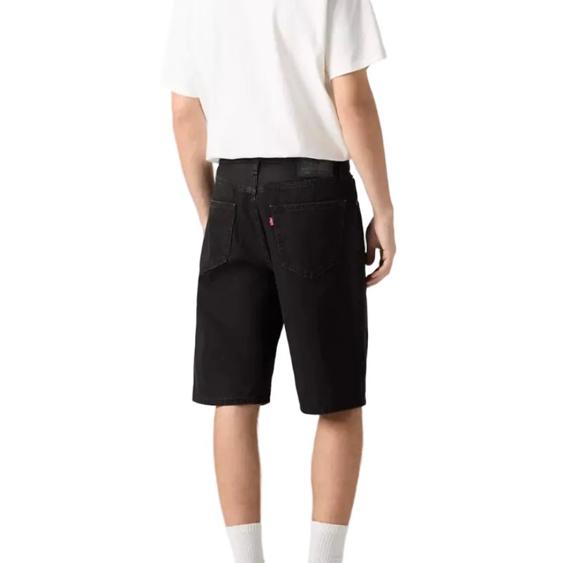 Load image into Gallery viewer, Person wearing a white t-shirt and black shorts on a plain background

