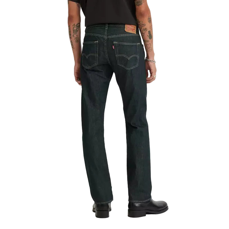 Load image into Gallery viewer, Man wearing a black t-shirt with the Levis 501 Original Clear Rigid jeans
