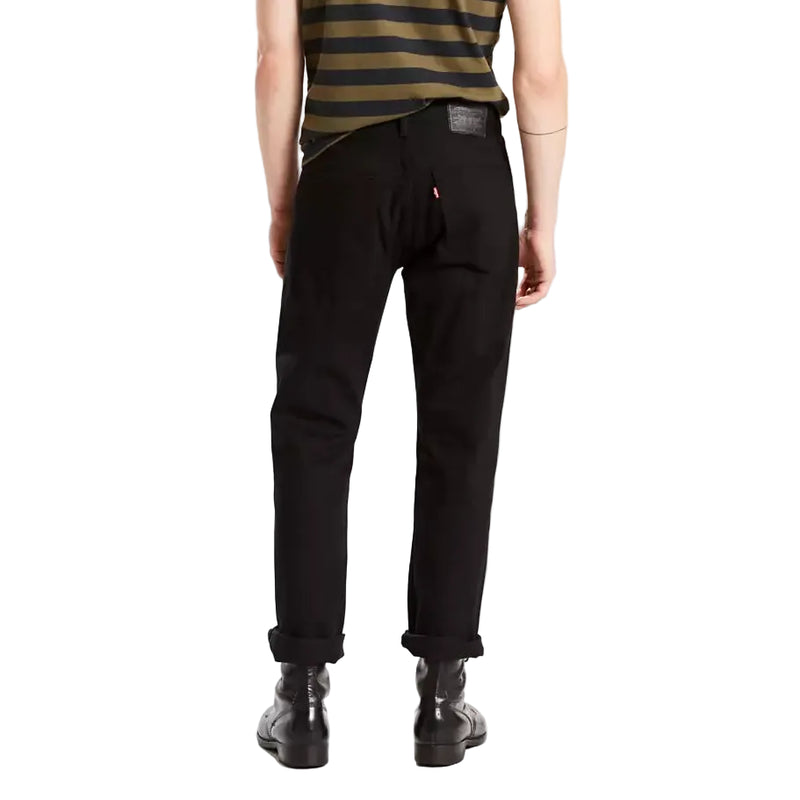 Load image into Gallery viewer, Man wearing a striped shirt and black pants on a white background
