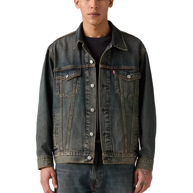 Load image into Gallery viewer, Man wearing a Levi's denim jacket on a plain background
