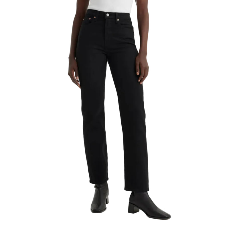Load image into Gallery viewer, Person wearing black jeans and black shoes on a white background
