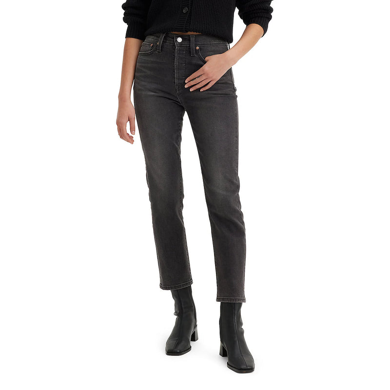Load image into Gallery viewer, Person wearing black jeans and black shoes on a white background
