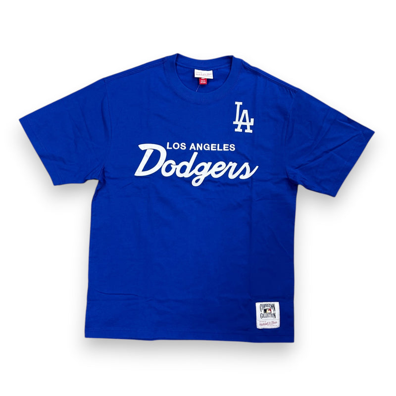 Load image into Gallery viewer, Flat lay of a blue 'Los Angeles Dodgers' shirt with the Dodgers logo on a white background. 
