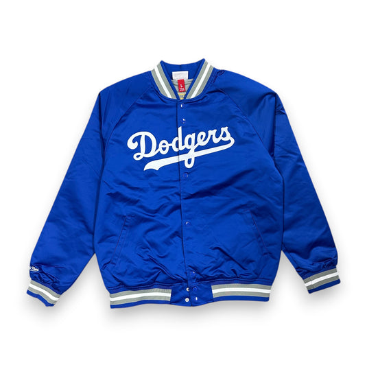 Blue satin jacket with 'Dodgers' text on chest.  Cuffs and collar are striped with a button-snap closure. 