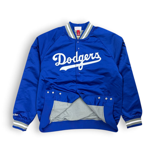 Blue satin jacket with a light gray interior on a white background. 