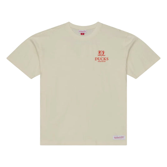 A light beige short-sleeve t-shirt with a small red embroidered logo on the left chest that reads 'DUCKS' with a duck head icon above it. The shirt is displayed flat against a clean, light gray background.