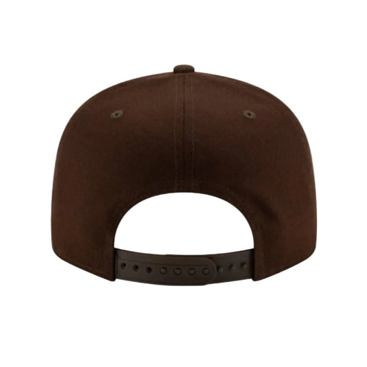 A dark brown structured snapback cap shown from the back, featuring a curved snapback closure strap, on a solid white background.
