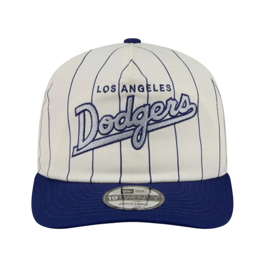 Los Angeles Dodgers baseball cap featuring an off-white pinstripe crown with blue embroidered lettering and a solid navy blue visor. A silver 19TWENTY adjustable strap tag is visible on the front of the visor.