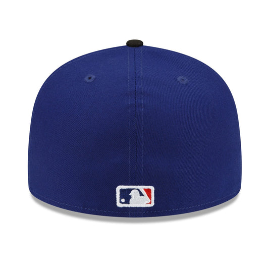 Blue baseball cap with MLB logo on a white background