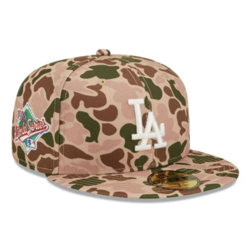 Load image into Gallery viewer, Camouflage baseball cap with 'LA' logo on a white background

