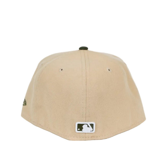 Beige baseball cap with MLB logo on a white background