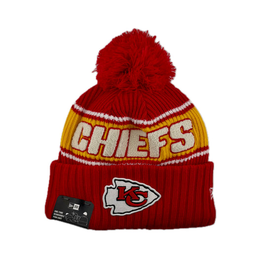 New Era Kansas City Chiefs Sideline 2024 red knit beanie with red pom-pom.  