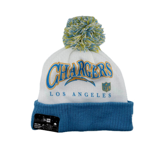 White beanie with blue cuff.  NFL Team Los Angeles Chargers knit beanie with blue, yellow and white pom-pom.  'Chargers Los Angeles' text on a white knit beanie. 