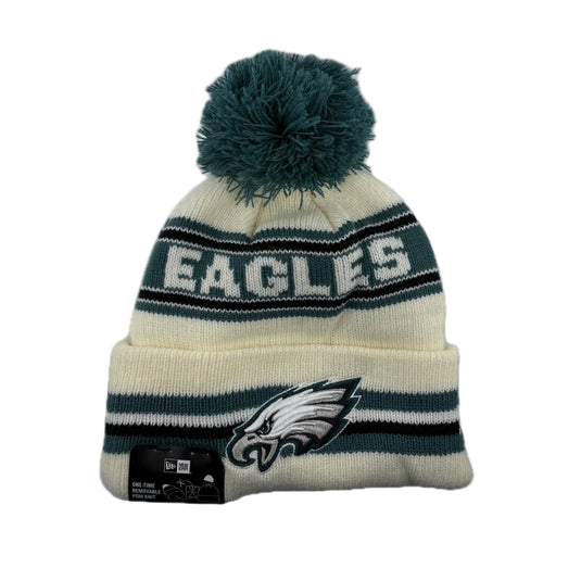 Off white New Era NFL Eagles Classic Knit Beanie with green pom-pom.