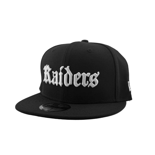 New Era NFL Raiders white gothic script  'RAIDERS' embroidery on a 59Fifty black cap. 