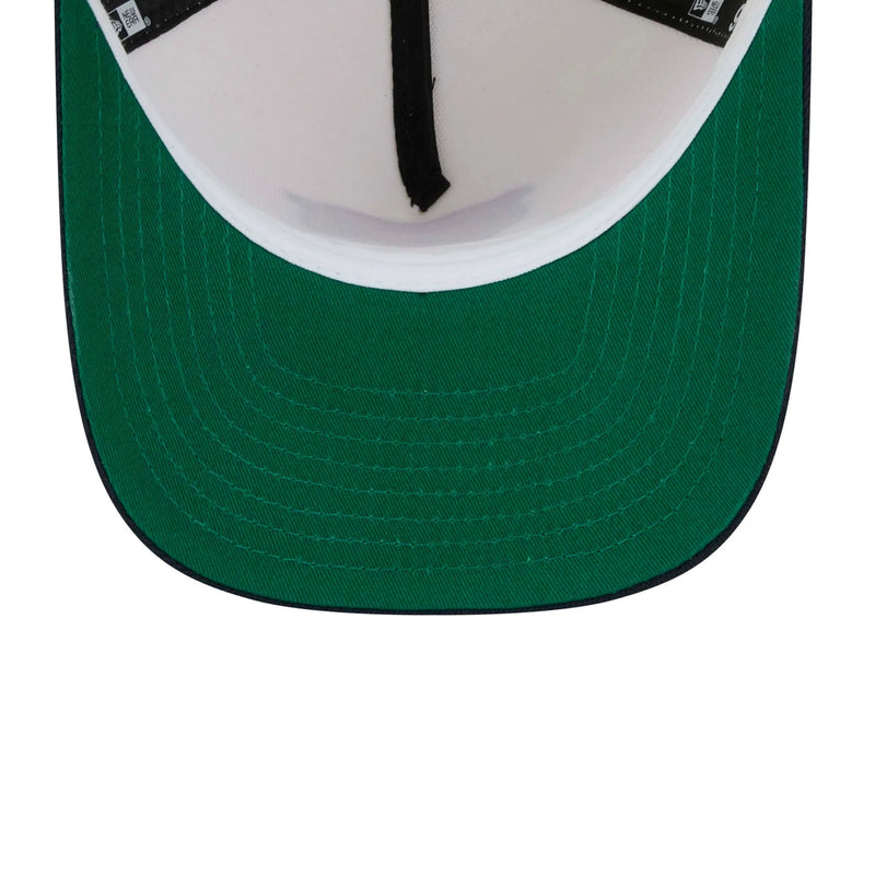 Load image into Gallery viewer, Close-up of the front of a baseball cap showing a dark green curved brim, a white inner crown, and black adjustable strap hardware.
