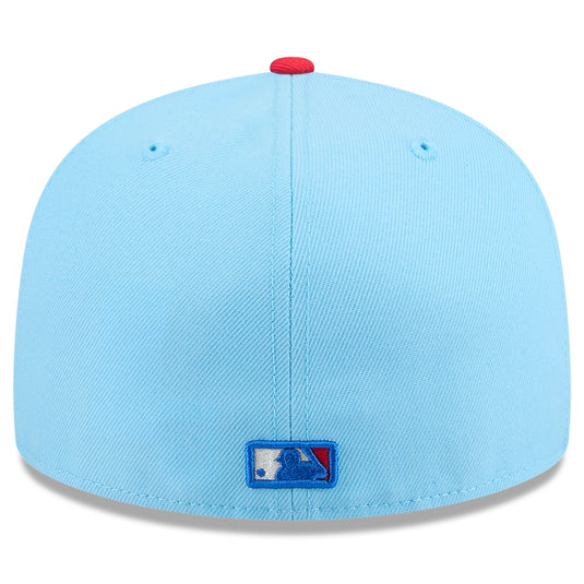 Light blue baseball cap with a logo on the brim against a white background