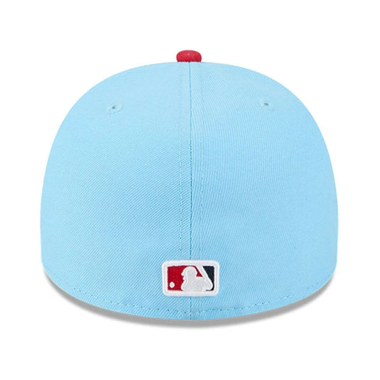Light blue baseball cap with a logo on a white background