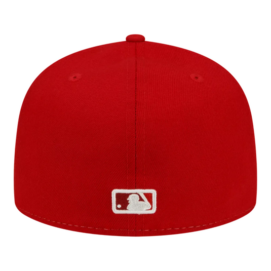 Red baseball cap with a white MLB logo on a white background