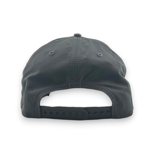 Back view of a dark gray baseball cap on a white background
