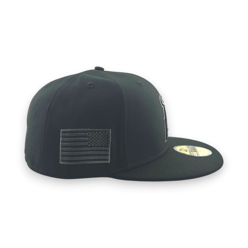 Load image into Gallery viewer, Black cap with American flag patch on a white background
