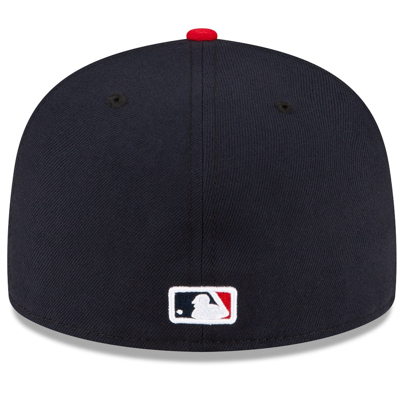 Load image into Gallery viewer, A navy blue baseball cap with a red button on top and a white, navy, and red MLB logo patch on the front, shown against a white background.
