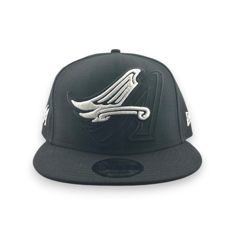 Load image into Gallery viewer, Black cap with a white logo on a white background
