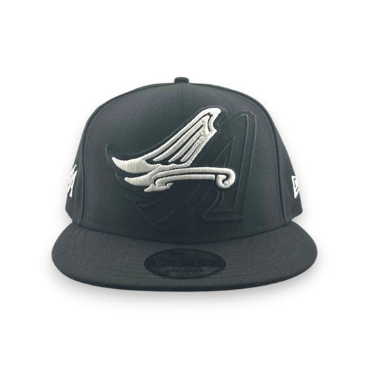 Black cap with a white logo on a white background
