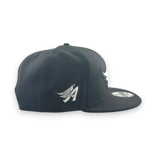 Black baseball cap on a white background