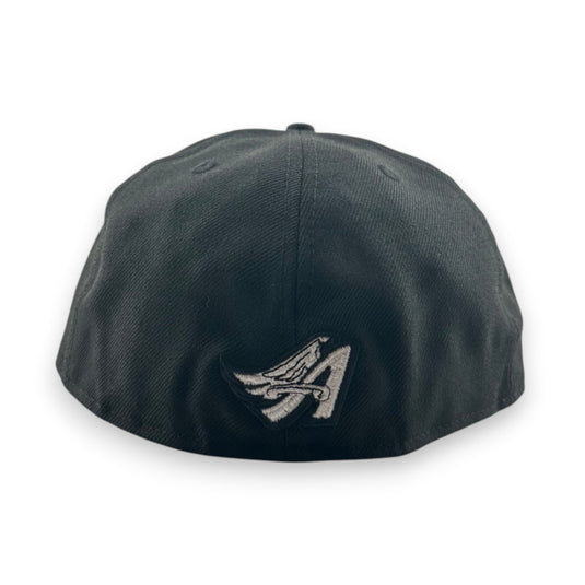Black cap with a white Angels logo on the back against a white background