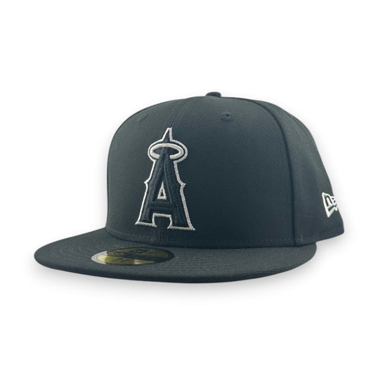 Black baseball cap with an Angels logo on a white background