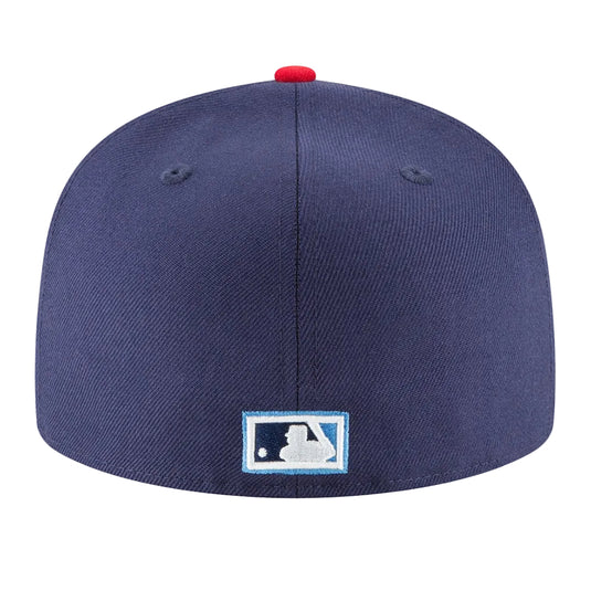 Navy blue baseball cap with a logo on the back against a white background