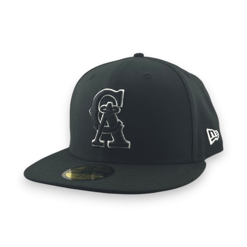 Load image into Gallery viewer, Black cap with a the California Angels 'CA' logo on a white background
