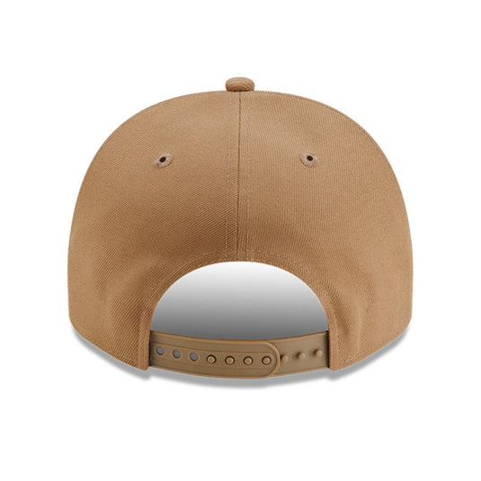 Brown baseball cap on a white background