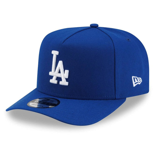 A royal blue Los Angeles Dodgers baseball cap with a white embroidered 'LA' logo on the front and a white New Era flag logo on the side, shown on a clean white background.