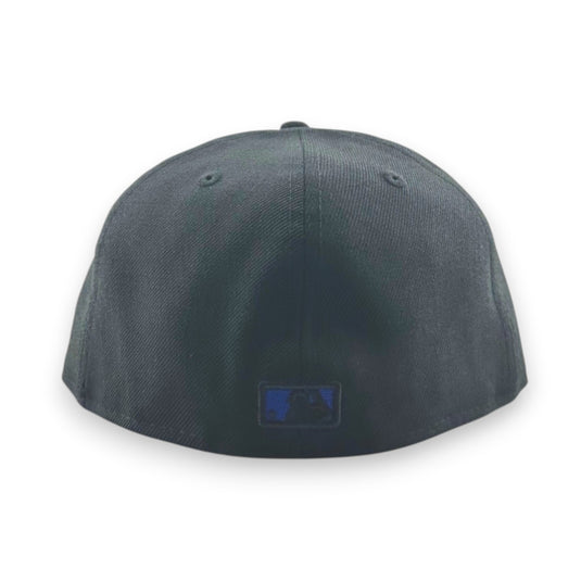 Black baseball cap with an MLB logo on the back against a white background