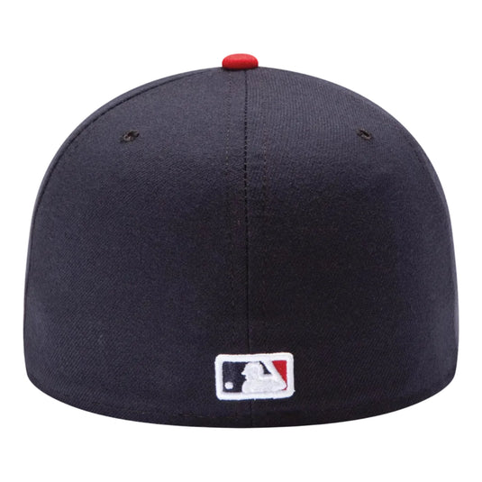 Navy blue baseball cap with a red brim and MLB logo on a white background