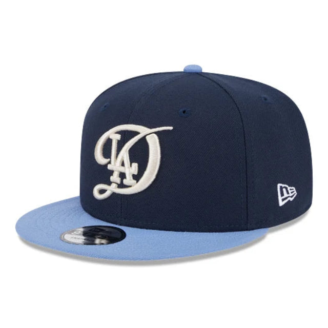 Load image into Gallery viewer, Blue 2-tone City connect Dodgers snapback with a navy crown and light blue visor
