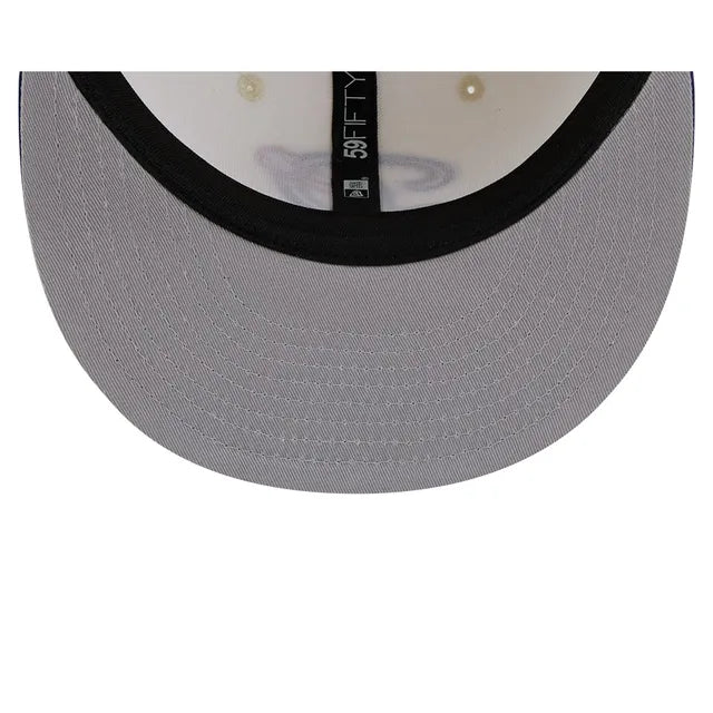 Load image into Gallery viewer, Close-up of the underside of a gray baseball cap showing the brim, black edge trim, and interior with pearl buttons and a black size tag reading 59FIFTY.
