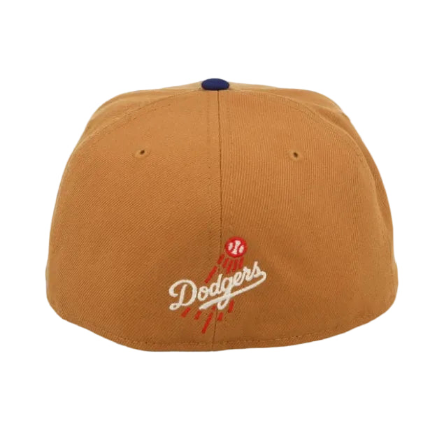 Load image into Gallery viewer, A tan baseball cap featuring an embroidered Los Angeles Dodgers logo on the front, with a small navy blue button on top, set against a plain white background.

