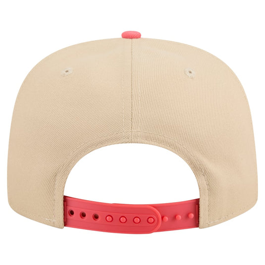 Back view of a beige snapback cap with a red adjustable strap and a red button on top, shown on a white background.